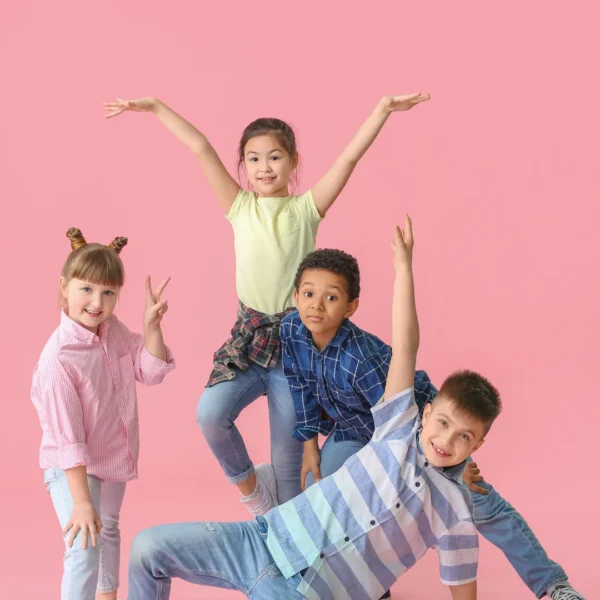 a group of happy children doing fun poses