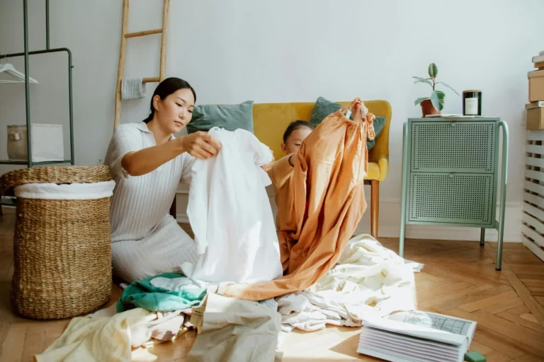 A mother teaching kid how to declutter clothes