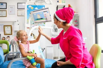 autistic girl at a clinic with her doctor