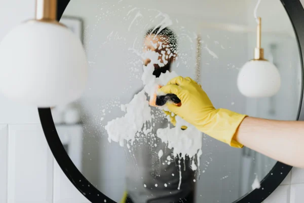 Deep cleaning the shower with basic supplies