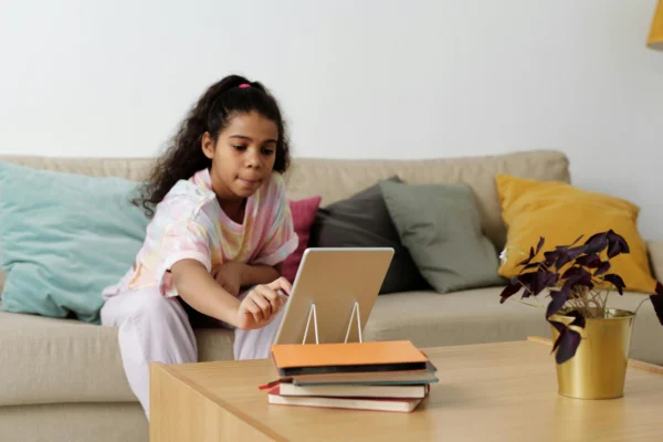 Kids using a tablet without parents’ supervision