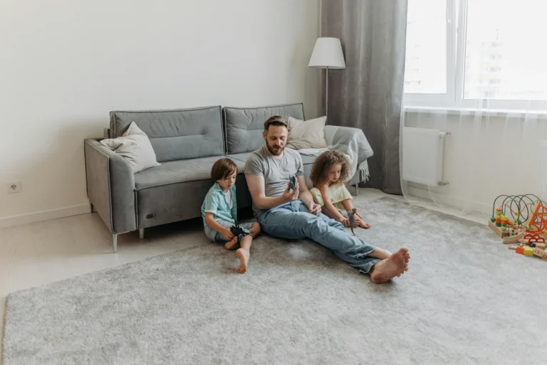 Parent teaching kids how to get along