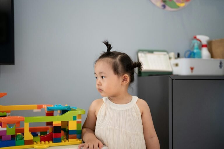 2-year-old child playing with building blocks